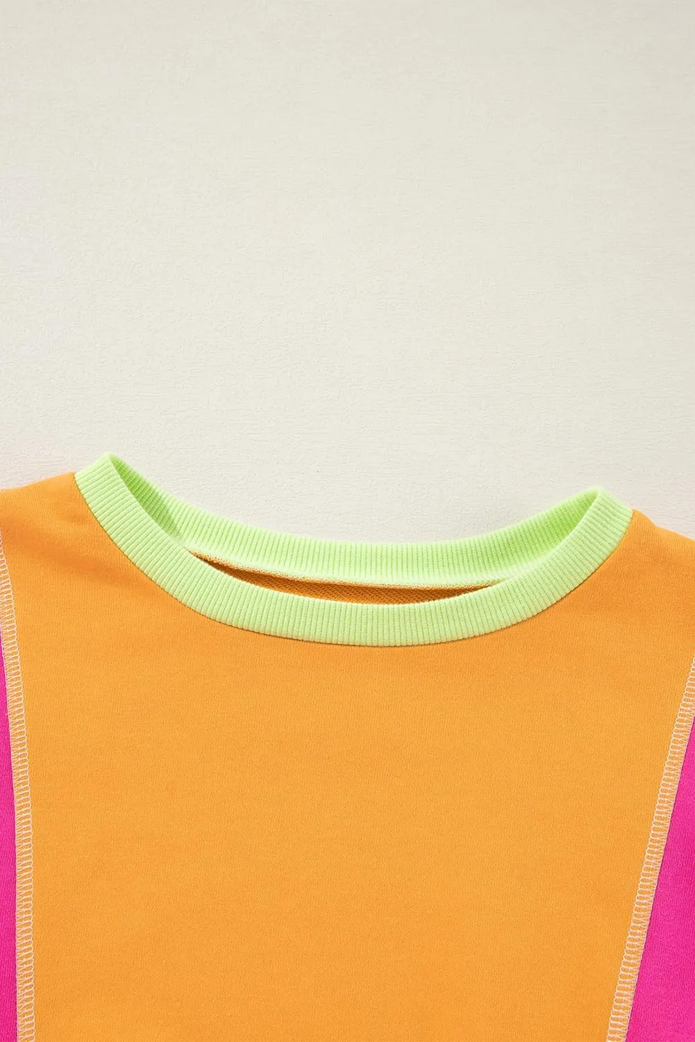 KevaMolly Womens Long Sleeve Tops Colorblock Patchwork Exposed Stitching Oversize Top Round Neck Casual Pullover